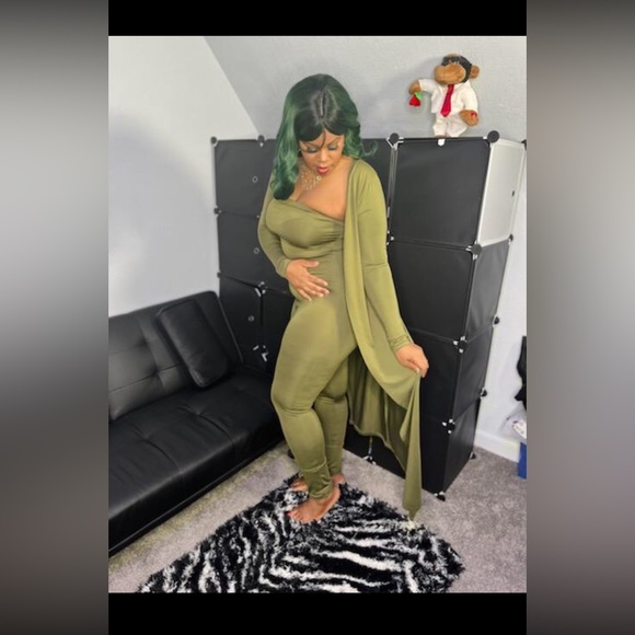 This 2 piece is gorgeous. Overlay jacket with tube top jumpsuit. - Picture 1 of 3